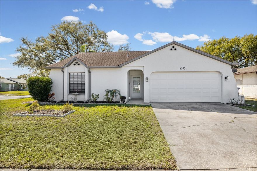 Welcome to this beautifully maintained, completely upgraded home in Park Lake Estates! As you enter the home, you can see the updated floors and baseboards with luxury vinyl plank throughout, natural lighting, upgraded light fixtures/fan and much, much more! The kitchen/dining room combo boasts elegance, as the kitchen has been completely remodeled with newer appliances, cabinets, granite counter tops, and a double oven! The 2 bedroom, 2 bathroom home is a split floor plan with the master including an en-suite bathroom.  Both bathrooms have been completely remodeled as well! There is a spacious screened in porch that leads to an oversized back yard that is fenced in for your privacy and pets needs! This home has no HOA, and is NOT in a flood zone, making the opportunities endless for you while also being very affordable! It is also right outside the Trinity area, near restaurants, shopping options, Trinity hospital and an easy route to the Tampa International Airport.  Schedule your showing today!!