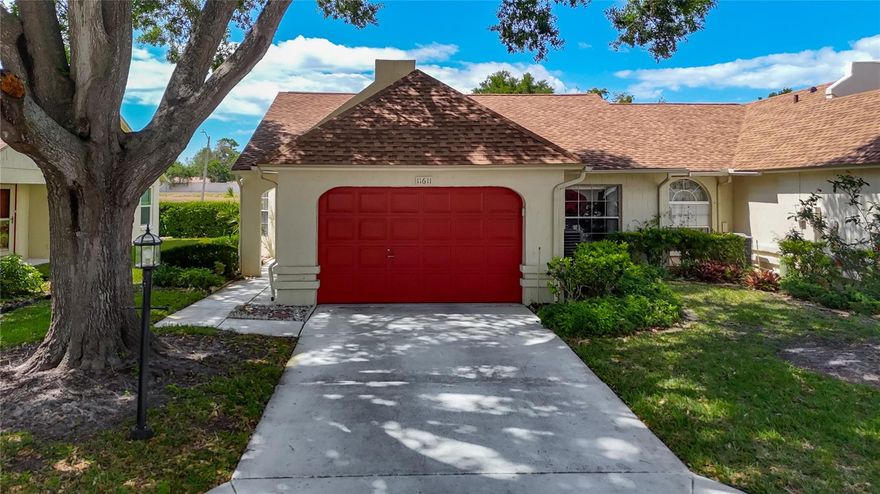 Welcome to this charming, updated villa nestled in the desirable 55+ Capri Village section of Timber Oaks. Enjoy peace of mind with impressive upgrades such as a roof (2022, maintained by HOA), a new AC (2025), and a tankless water heater (2022) and vinyl flooring. The renovated eat-in kitchen is a chef’s delight, featuring modern soft-close cabinets, granite countertops, a stylish tile backsplash, and stainless-steel appliances. The warm and inviting living room offers a comfortable space for relaxing or entertaining guests. This split bedroom plan provides privacy, with the spacious master suite boasting a walk-in closet and a master bath with a walk-in shower and makeup vanity. The second bedroom is generously sized and also includes a walk-in closet, perfect for guests or extra storage. A full second bath adds convenience for visitors. Step outside to a small back patio where you can enjoy your morning coffee or unwind in the evenings. Located in a vibrant community with amenities tailored for active adults, this villa combines modern upgrades with comfort and style. Don’t miss your chance to live in Timber Oaks’ Capri Village—schedule your showing today! HOA fee covers building exterior maintenance, all exterior grounds, building insurance, roof, escrow, cable/internet, pest control. Master fee covers pool, clubhouse, tennis courts, bocce ball court, shuffleboard. This home has been well maintained and move-in ready. Minutes from US 19 and Close to the Suncoast parkway for quick access to the airport, Tampa, Clearwater and St. Pete Beaches (Ranked in the top 5 Beaches in the US), also close to SunWest Park…an outdoor recreation water park, beach, swimming and gorgeous sunsets, Homosassa Springs, the famous Weeki Wachee live mermaids and Tarpon Springs Sponge Docks. Short drive to beautiful downtown New Port Richey…a historic Rivertown community in north Tampa Bay with award-winning restaurants, shops, bars, and breweries. Natural amenities like Sims Park, the Cotee River, and James E. Grey Preserve are waiting to be explored.