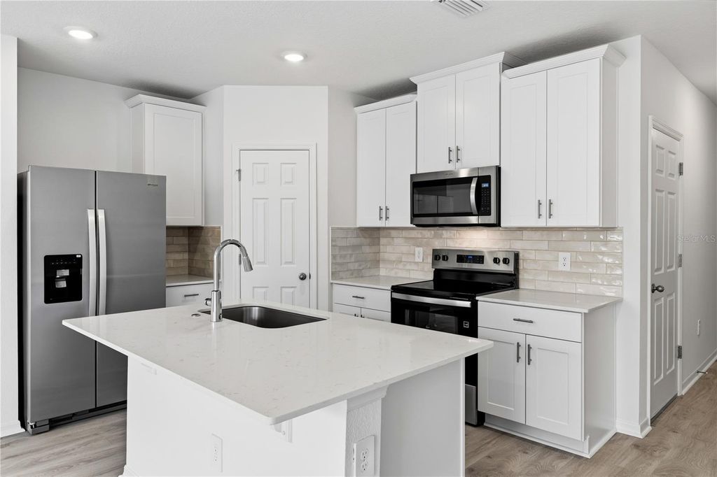 Photo of 16278 Bird Of Paradise Avenue, Clermont, FL 34714 (MLS # O6425859)