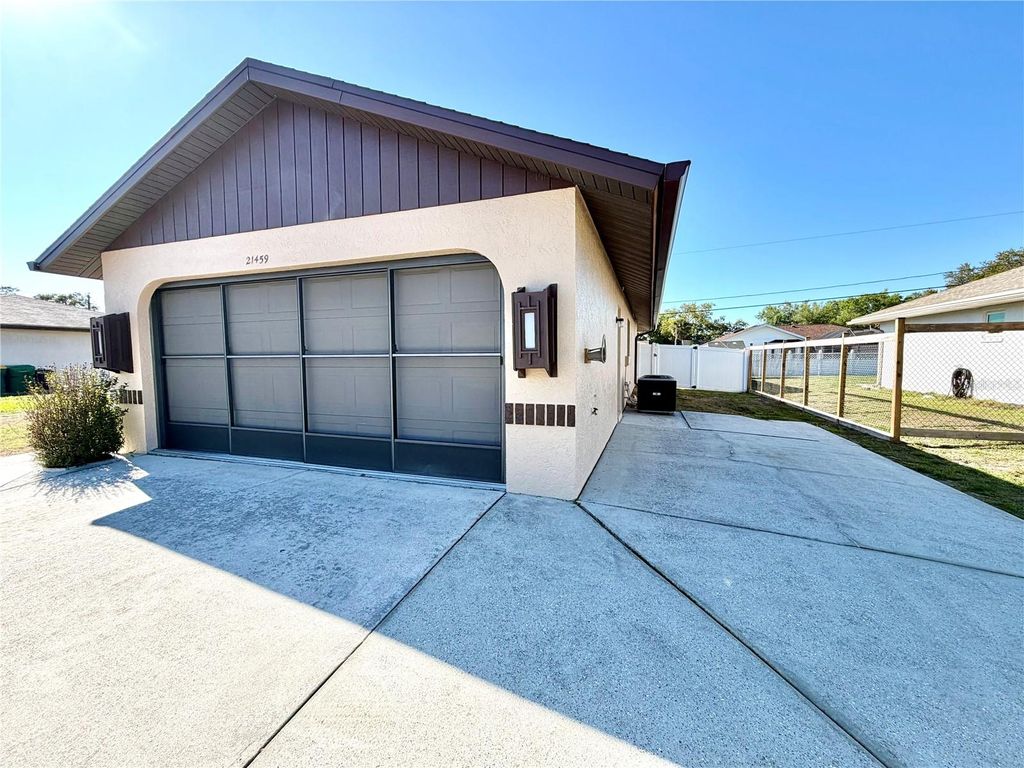 Photo of 21459 Landis Avenue, Port Charlotte, FL 33954 (MLS # C7523795)