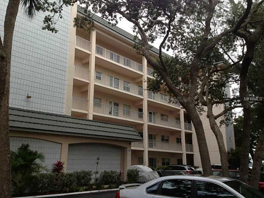 You won't want to miss this beautifully updated 2/2 condo in Bay Tree Club. No need to drive to the public beach with this one, you can keep your beach gear in your private cabana and walk over to your private beach access on the west side of the complex.If you'd prefer a day on the boat, you can walk out your building and over to your deeded boat slip on one of the private docks. After all that time in the sun, surf, and sand you'll have an easy time cleaning up these beautiful tile floors, because whowants to spend all day cleaning when you could be at one of the pools and having a cookout at one of the community grills? Like I said, you won't want to miss this condo.