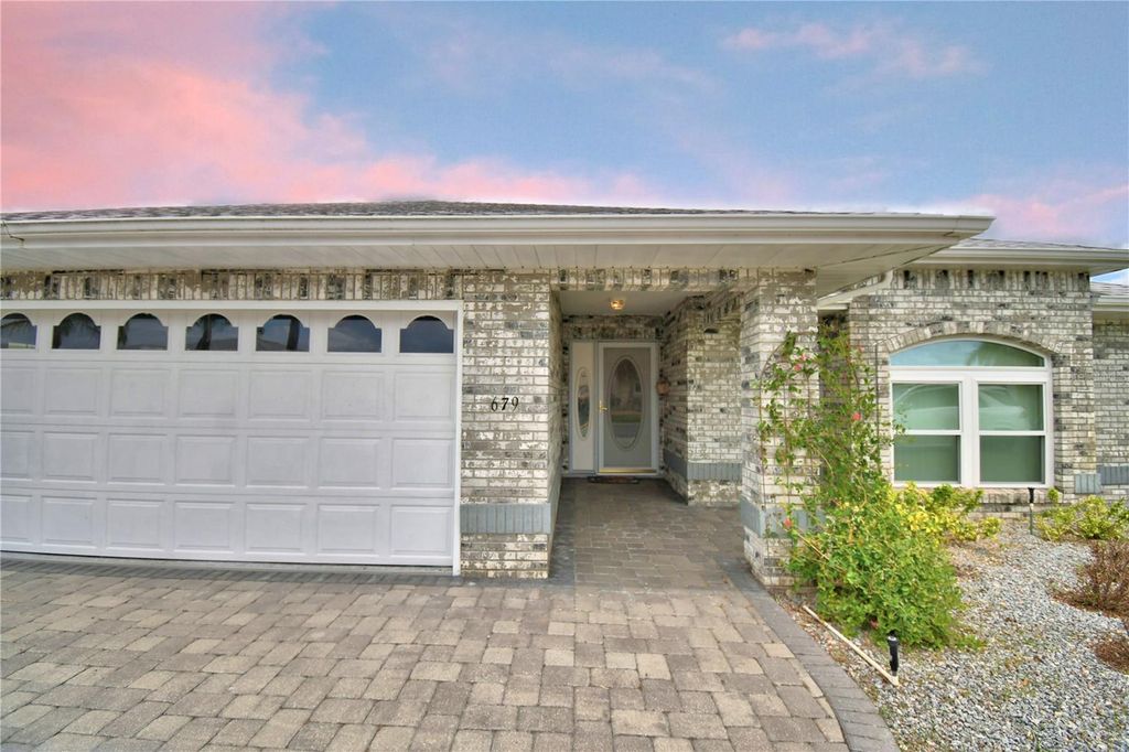 Photo of 679 Sweetwater Way E, Haines City, FL 33844 (MLS # L4961347)
