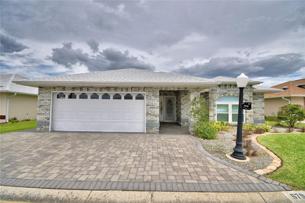 Photo of 679 Sweetwater Way E, Haines City, FL 33844 (MLS # L4961347)