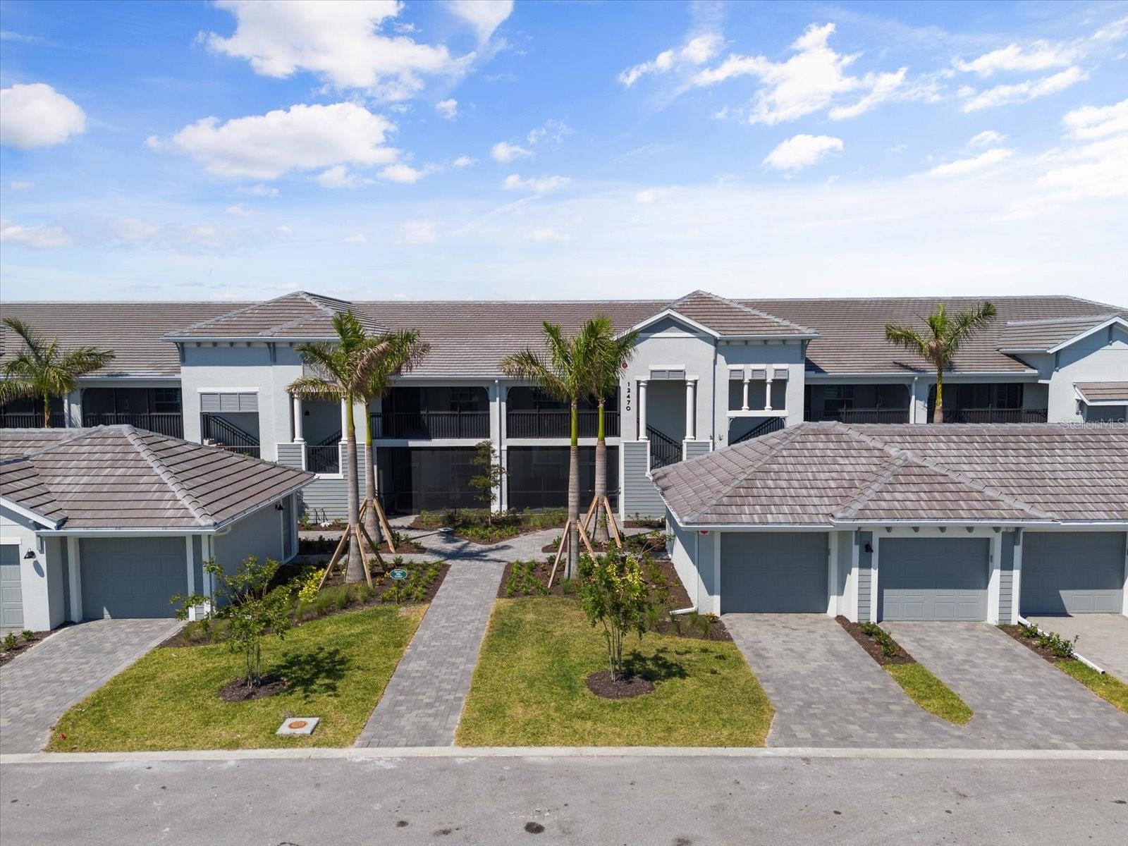SPECIAL PRICING OF $2,300 (EACH MONTH) IF YOU BOOK FOR AT LEAST 1 MONTH FROM JULY 2025 - DECEMBER 2025 --- WELLEN PARK GOLF & COUNTRY CLUB --- BRAND NEW TURNKEY FURNISHED 2 BEDROOM + DEN, 2 FULL BATH, 1 CAR GARAGE VERANDA --- High Season (December-April): $6,500/month (utilities included; electric capped at $100/month) --- Low Season (May- November): $2,500/month + Guest reimburses for electricity. --- Welcome to your dream getaway in the heart of Wellen Park! This beautifully designed 2-bedroom + den, 2-bathroom second-floor veranda offers breathtaking views and modern comforts. The open-concept layout features a spacious living area, a fully equipped kitchen with granite countertops and stainless steel appliances, and a private screened balcony perfect for relaxing. The primary suite boasts an en-suite bathroom with dual vanities and a walk-in shower. Enjoy resort-style amenities, including a championship golf course, pool, fitness center, tennis, pickleball, and a tiki bar (some amenities are still under construction). Conveniently located near Downtown Wellen’s vibrant shopping, dining, and entertainment, this condo is perfect for your seasonal retreat or year-round living! --- Durations 6 months or less require 13% additional tax and all funds paid up front. Durations longer than 6 months require first, last, security deposit & credit application fee. Membership transfer required. Pet friendly upon owner approval and $500 non-refundable pet fee. For reservations longer than 6 months: All Suncoast Leasing and Management residents are enrolled in the Resident Benefits Package (RBP) for $50.95/month which includes renters' insurance, HVAC air filter delivery (for applicable properties), move-in concierge service making utility connections and home service setup a breeze during your move-in, our best-in-class resident rewards program, and much more!