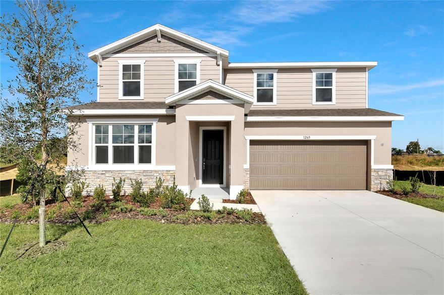 Welcome to this desirable Ammolite home, ready for quick move-in. Included features: a covered entry; an eye catching great room; a beautiful kitchen offering 42" cabinets, quartz countertops, a generous island, a built-in  pantry, and an adjacent dining nook; a convenient powder room; a main-floor guest suite boasting a living room, a bedroom, and an attached bath; an airy loft; a luxurious primary suite showcasing an oversized walk-in closet and a private bath; three secondary bedrooms; a shared hall bath; an upstairs laundry; and a relaxing covered patio. Tour today!  SAMPLE PHOTOS, actual homes as constructed may not contain the features and layouts depicted and may vary from image(s). *Take advantage of special financing on quick move-in homes OR buy a to-be-built home and enjoy up to $20,000 in Flex Funds toward homes that can close in a timely manner! Options may vary by community, and offers are available on select homes on a first-come, first-served basis. Contact builder for more information!