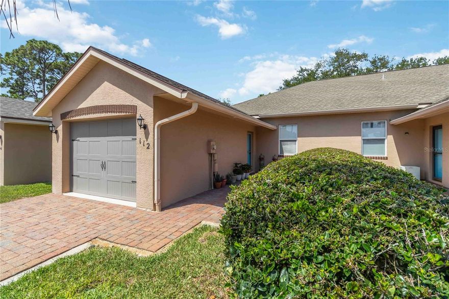 Well-maintained condo in a desirable 55+ community in Edgewater. Light and bright with high ceilings, a spacious living and dining area, functional kitchen, and comfortable layout. Enjoy a screened-in Florida room for added living space, plus a front patio perfect for relaxing. Generous bedrooms and flexible second bedroom for guests or office. Features include a newer A/C (2023) and attached garage. Conveniently located near shopping, dining, and local waterways. Low-maintenance living in a peaceful, well-kept community.