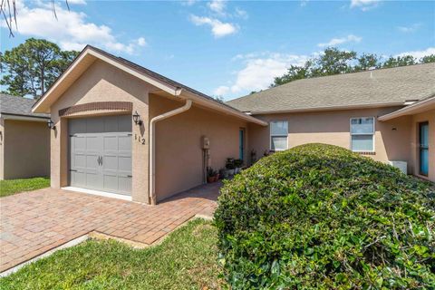 Photo of 112 Tuscany Villas Drive #112, Edgewater, FL 32141 (MLS # NS1088101)