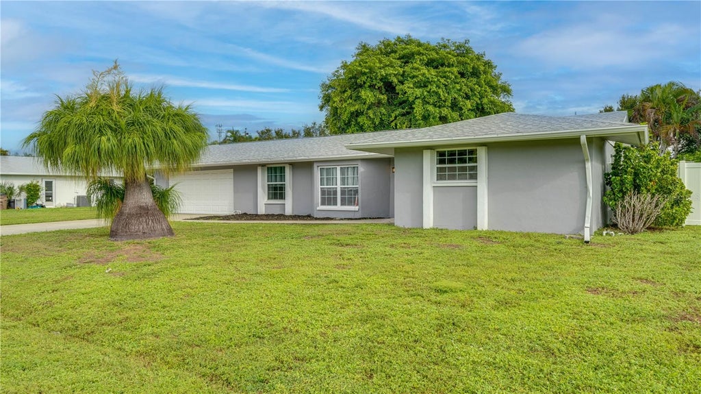 Photo of 909 SE 27th Street, Cape Coral, FL 33904 (MLS # C7531863)