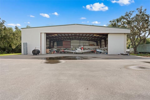 Photo of 10601 SW 147th Circle, Dunnellon, FL 34432 (MLS # OM731207)