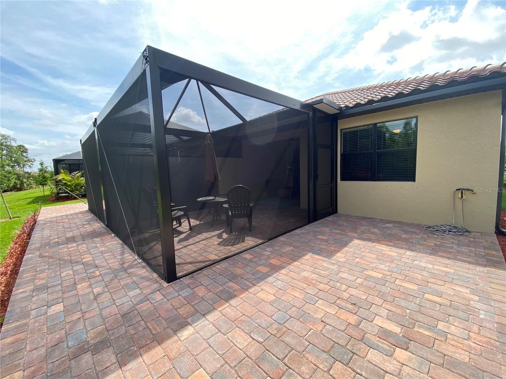 Photo of 12391 Amica Loop, Venice, FL 34293 (MLS # A4677966)
