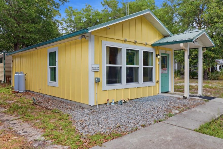 Charming Cottage Near Rainbow River – Move-In Ready!
Discover this adorable 1-bedroom cottage in the heart of Dunnellon, just minutes from the stunning Rainbow River. Thoughtfully designed and solidly built with 2x6 construction, this home features a durable 40-year metal roof, cathedral ceilings, and recessed lighting throughout. Mini split AC unit in addition to Central Heat and Air.
The interior boasts granite countertops in both the kitchen and bath, a beautifully upgraded shower with solid panels, wood-look tile flooring, stainless steel appliances, and solid wood cabinetry with soft-close doors—combining style with long-lasting quality.
Step outside and enjoy additional features that truly set this property apart:
• A versatile shed perfect for a workshop, studio, or entertainment space 
• EV/RV hookups for added convenience 
• No HOA restrictions 
Located just minutes from Blue Run of Dunnellon Park, you’ll have quick access to kayaking, swimming, and nature trails. You’re also close to the scenic Withlacoochee State Trail—ideal for biking and outdoor enthusiasts.
Enjoy the peaceful, small-town charm Dunnellon is known for, with friendly neighbors, local shops, and nearby dining. You’re within easy reach of Crystal River, Homosassa, and Rainbow Springs State Park, plus local favorites like holiday parades and Boomtown Days. The World Equestrian Center is just a short 20-minute drive, and the Gulf Coast is within easy reach.