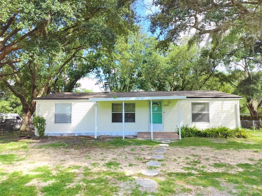 Move-in ready 3 bedroom, 2 bath home on a 1/2-acre lot is waiting for a new owner. NEW shingle ROOF! The kitchen and baths have NEW hard surface counters, cabinets, fixtures and newer appliances. NEW Luxury Vinyl Plank floors compliment the neutral color palette throughout.   Nice, shaded yard with plenty of room for outdoor recreational toys. Think RV, Boat, Outdoor Kitchen. The screened area provides room to rock, relax and rest. Major systems: Well pump 2025; Drainfield 2025; Repipe 2022; HVAC 2019. Come see this one today!