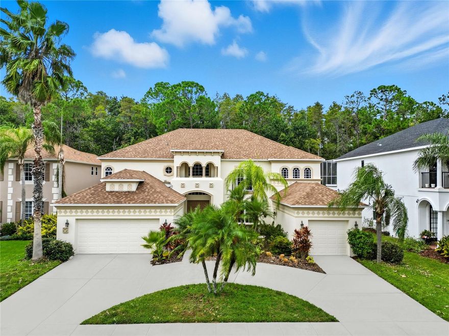 Presenting Magnificent Estate, an extraordinary Mediterranean-inspired masterpiece nestled within the prestigious Seven Oaks community. This stunning residence harmonizes timeless elegance with modern refinement, offering an unparalleled living experience. From the moment you arrive, the circular driveway and stately garages make a striking first impression, setting the stage for what lies beyond. Step through the grand entrance and be welcomed by an interior that radiates sophistication and comfort. The formal living room provides the perfect ambiance for elegant gatherings or quiet afternoon tea, while the adjacent formal dining room offers an exquisite setting for memorable dinners. The gourmet kitchen is a culinary showpiece, featuring expansive granite countertops, premium cabinetry, and generous space ideal for both intimate meals and grand entertaining. Flowing effortlessly from the kitchen, the spacious family room invites relaxation with its warm atmosphere and seamless connection to the outdoors. The primary suite is a sanctuary of luxury, showcasing a beautifully remodeled spa-inspired bathroom and an expansive walk-in closet. Down the hall, a stylish guest bathroom and large bedroom offer refined comfort and privacy. Ascend the graceful staircase to find four additional bedrooms—each boasting its own walk-in closet—along with two full baths and a versatile loft overlooking the grand living spaces below. Around the corner, an exceptional bonus room awaits—perfectly suited for a home theater, game room, or private retreat. Step outside to your private resort oasis where the shimmering pool and spa, surrounded by exquisite travertine tile, create a breathtaking backdrop for outdoor entertaining or tranquil relaxation. Every detail of this Estate Magnificent residence embodies luxury, comfort, and impeccable design—truly redefining the meaning of home.