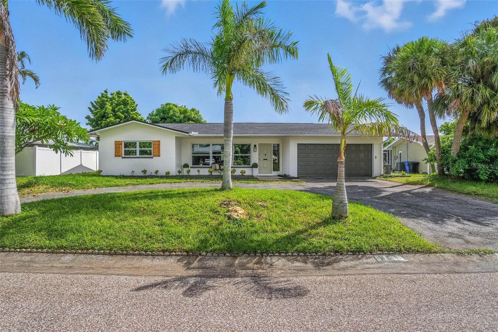 Welcome to this beautifully remodeled 3-bedroom, 2-bath home in Maximo Moorings—an entertainer’s dream. Recent upgrades include a brand-new roof (2025), HVAC system (2025), new kitchen appliances, and fresh exterior paint, giving you the peace of mind of a move-in ready home.
Step inside to a bright, open interior where every detail has been thoughtfully updated.
At the heart of the home, the newly designed kitchen impresses with sleek stainless-steel appliances, a striking tile backsplash, generous counter space, and abundant storage. Just beyond, the dining and living areas connect effortlessly, with elegant tile flooring creating a seamless flow that makes both everyday living and entertaining a breeze.
Both bathrooms have been fully transformed into modern retreats, featuring contemporary finishes and custom-tiled showers. The three bedrooms are spacious and versatile, ready to serve as restful escapes, a home office, or a creative space.
Enjoy the Florida lifestyle year-round on the screened-in patio overlooking the backyard—ideal for morning coffee, evening cocktails, or simply relaxing outdoors.
Perfectly located just minutes from the Gulf beaches, Eckerd College, I-275, the newly renovated Maximo Marina with waterfront dining at Tiki Docks, plus an array of restaurants and shopping, this home blends comfort, style, and convenience.
Don’t miss your chance to make this home yours—schedule a private showing today!