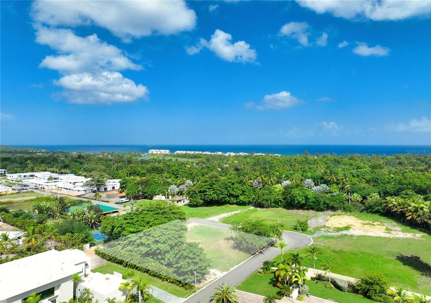 ***SOLD*** Nestled within the confines of the exclusive Dorado Country Estates, this corner lot presents a rare opportunity to own a prime piece of paradise. The spacious, well-appointed lot is a canvas for your dream residence, offering endless possibilities for a luxurious lifestyle in a meticulously planned and gated enclave. As the fortunate owner of this corner lot, you'll have the privilege of crafting a home tailored to your unique vision. With the grandeur of the resort community as your backdrop, your future dwelling can be designed to capture natural beauty, and an ambiance of elegance and relaxation. Residents benefit from the security and services of a gated community, ensuring a life of comfort and tranquility. This corner lot, with its prestigious location and endless potential, promises a lifestyle that's nothing short of extraordinary. It's an invitation to create your own piece of paradise in a resort community that epitomizes luxury and leisure. This private gated community is located in Dorado with access to the island's premier resort in the Caribbean. Dorado Country Estates consists of 64 private custom designed homes. Enjoy exclusive access to world-renowned amenities such as top golf courses, beach club, spa sanctuary, state of the art fitness center, biking trails, water sport facilities, beaches and more with the required club membership for residents. Only a 35-minute drive from San Juan and an additional 10 minutes to SJU airport. Experience the epitome of resort living while still being within close proximity to the city. Monthly HOA: $497.03.