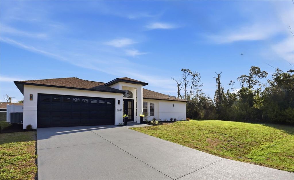 Photo of 1842 Calahan Avenue, North Port, FL 34288 (MLS # C7525076)