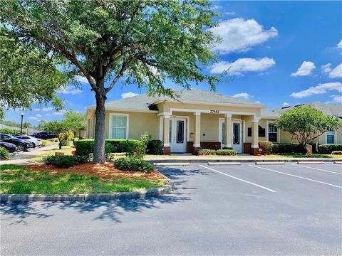 Photo of 27453 Cashford Circle #101, Wesley Chapel, FL 33544 (MLS # TB8411428)