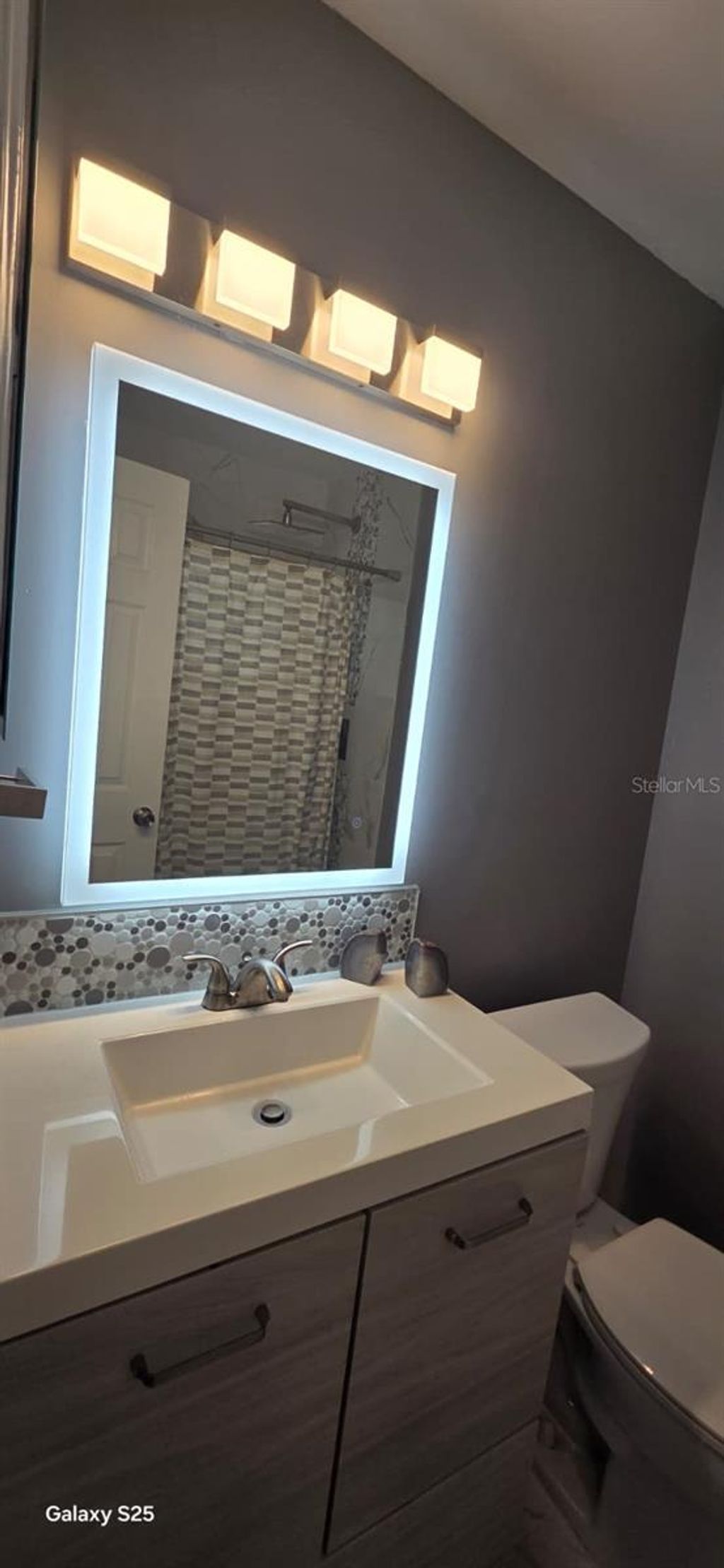 Photo of 9910 Burl Way, Orlando, FL 32817 (MLS # TB8444557)