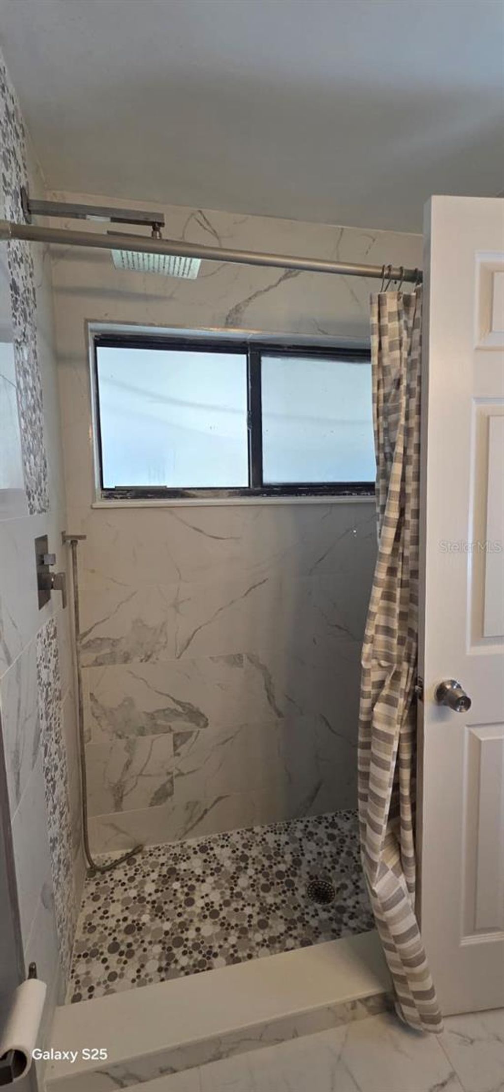 Photo of 9910 Burl Way, Orlando, FL 32817 (MLS # TB8444557)