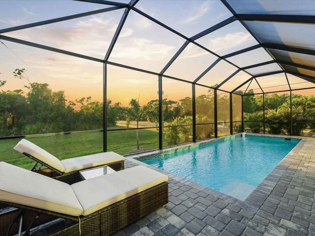 Photo of 149 Long Meadow Lane, Rotonda West, FL 33947 (MLS # C7517536)