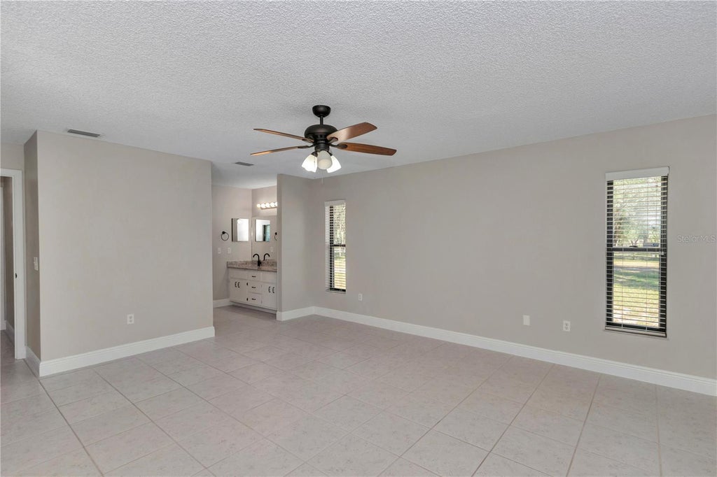 Photo of 11101 SW 128th Avenue, Dunnellon, FL 34432 (MLS # O6447742)