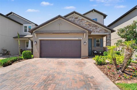 Photo of 9625 Wild Begonia Loop, Land O Lakes, FL 34637 (MLS # TB8494937)