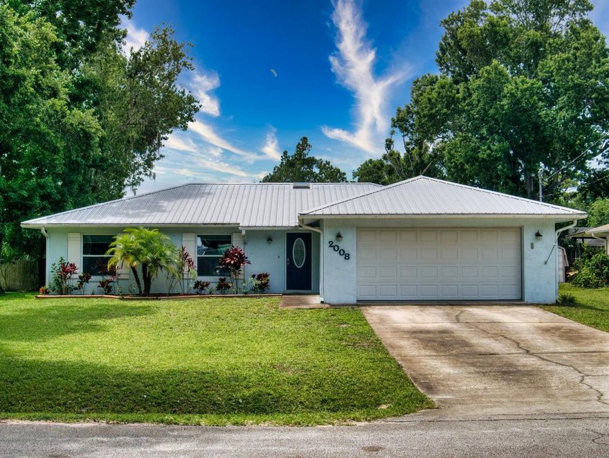 Come enjoy the Sun in this New Smyrna gem! Check out the 3-D tours for this 3 Bedroom/2 Bath home that has a recent total kitchen remodel with granite countertops, wine cooler, stainless steel appliances, gas stove and a beautiful stainless hood that shines under the recessed lighting.  Wood tile flooring throughout with new paint and a remote control gas fireplace creates a cozy space.  New metal roof in 2016.  Both bathrooms have also been nicely renovated.  This home has lighting dimmers throughout, surround sound speakers, a digital Bluetooth thermostat and more.  The home has a large screened back porch overlooking a large fenced yard and an air-conditioned He/She shed!  The AC was recently fitted with new coils and the new gas dryer was replaced in 2020. The drain field was just replaced and the septic has recently been pumped and serviced, along with new grass in the backyard.  Don't miss your opportunity! ;Water: City