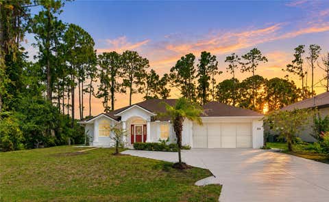 Photo of 64 Whittington Drive, Palm Coast, FL 32164 (MLS # FC320453)
