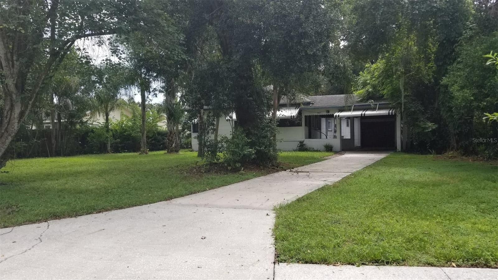 INVESTOR SPECIAL - CASH ONLY!! This 3 bedroom / 1 bathroom home is ideally located in central Lakeland. Property features hardwood floors throughout most of the home, screened front porch, carport with storage and sits on a large lot. Fixer upper property. All listing information is deemed reliable but not guaranteed and should be verified through personal inspection by appropriate professionals. Buyer and Buyer's Agent to verify all information. Being sold "AS IS" for Seller's convenience.