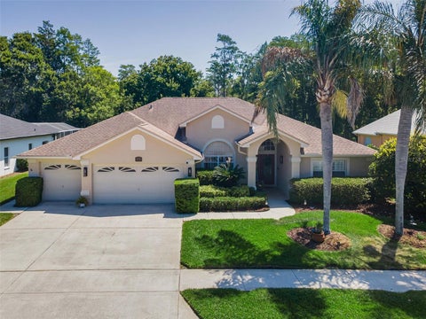 Photo of 1234 Arlinbrook Drive, Trinity, FL 34655 (MLS # W7888884)