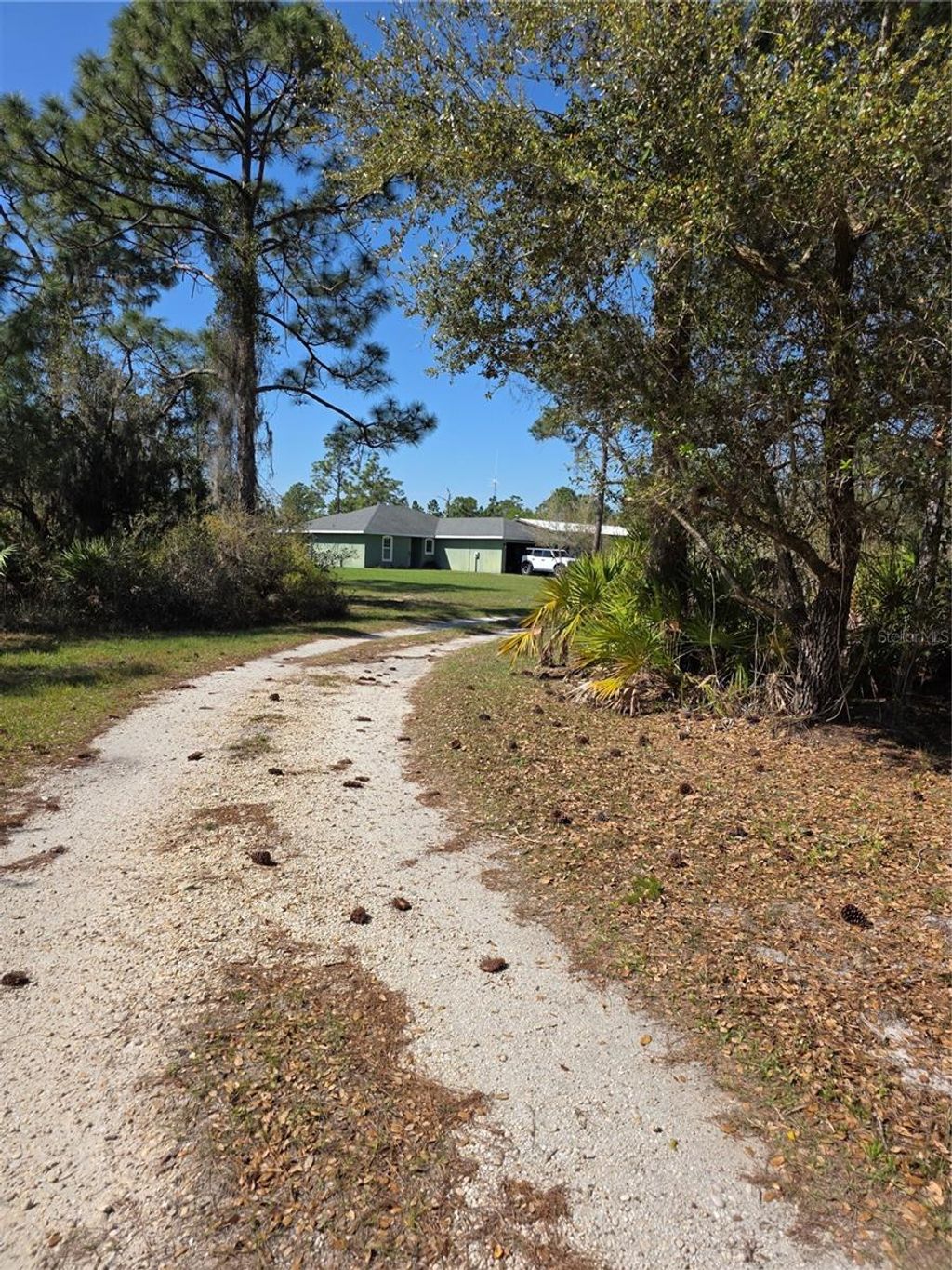 Photo of 1991 Rosalie Lake Road, Lake Wales, FL 33898 (MLS # K4903377)