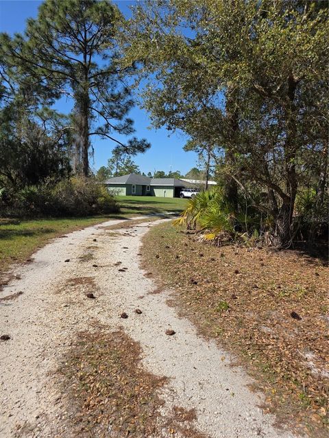 Photo of 1991 Rosalie Lake Road, Lake Wales, FL 33898 (MLS # K4903377)