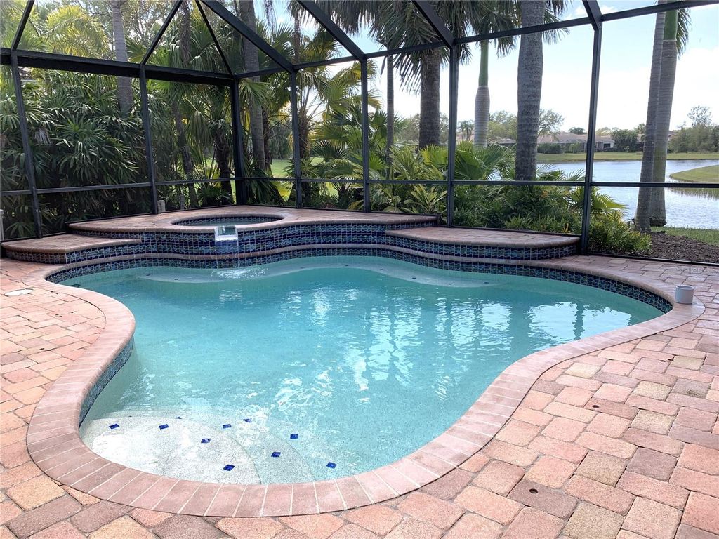 Photo of 6828 Honeysuckle Trail, Lakewood Ranch, FL 34202 (MLS # A4676392)