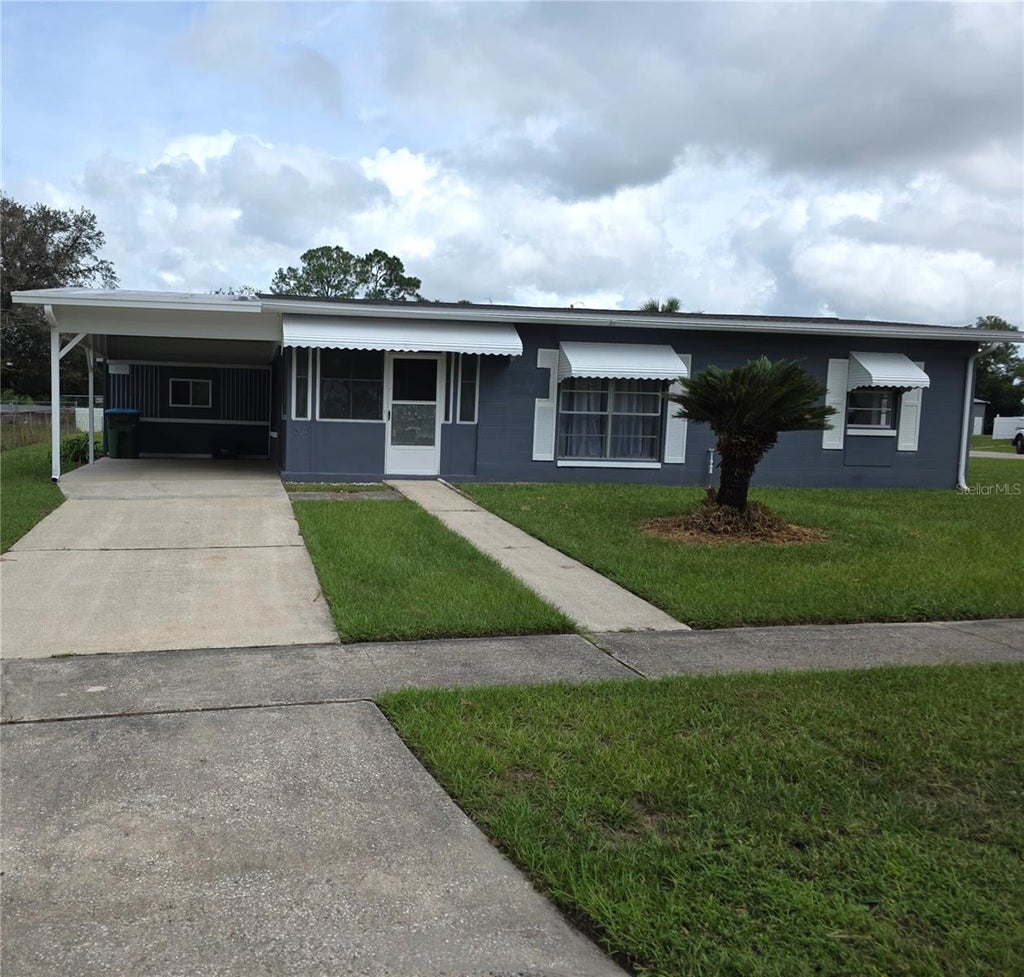 Photo of 802 Crawford Street, Deltona, FL 32725 (MLS # O6423330)