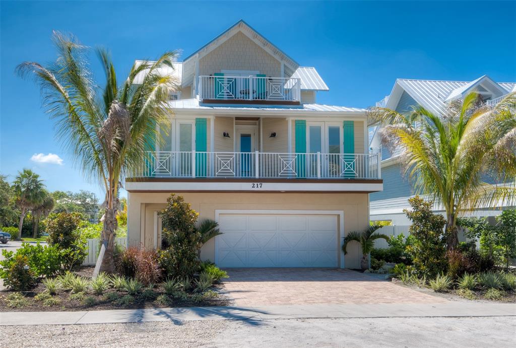 Welcome to "Absolute Paradise" at 217 Magnolia Ave! This wonderful property that features 5 Bedrooms and 4 Bathrooms, a private tropical pool and spa, covered patio and multiple outdoor decks including a rooftop deck with amazing 360 degree views of Anna Maria island and the sparkling blue waters of the Gulf of Mexico. This home offers bright open living space; Large open kitchen with granite counters, breakfast bar and stainless steel appliances. Large family and dining room to accommodate many family members and guests. The bedrooms are spacious and most are en-suite with access to outdoor decks. In addition to the over 2,500 sq ft of indoor living space, You get the incredible outdoor entertaining space and amenities. Lounge, Grill and Relax by the tropical pool and spa, Take the spiral stairs to the multiple decks and then to the rooftop for some picture perfect sunsets! Go for a short stroll directly down the block to Ginny and Jane E's or straight to the world class beaches at The Gulf of Mexico. There is so much more; only minutes to bustling Pine Ave boutique shopping, great restaurants, The Community Center, AMI City Pier and the Bayfront! Plenty of storage for all your beach toys, golf carts and guest parking. This is a perfect 2nd vacation home and or excellent rental investment property! Don't hesitate, own your Piece of Paradise today before it's gone!