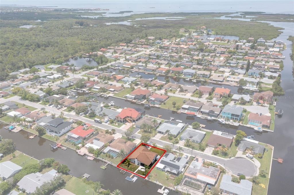 Photo of 9910 Island Harbor Drive, Port Richey, FL 34668 (MLS # TB8416352)