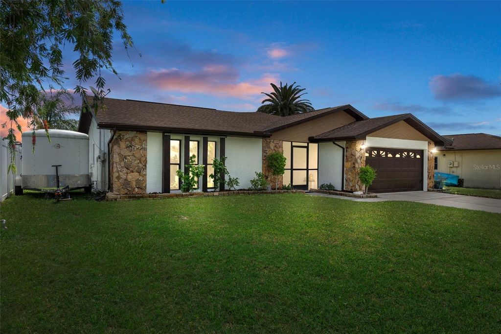 Photo of 9910 Island Harbor Drive, Port Richey, FL 34668 (MLS # TB8416352)