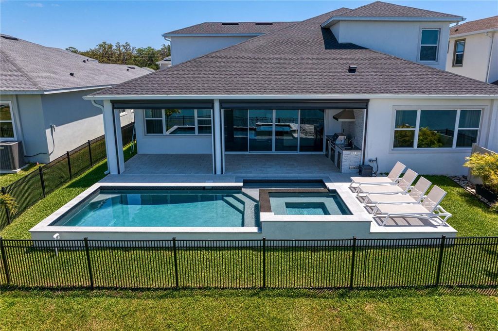 Photo of 8346 Ivy Stark Blvd, Wesley Chapel, FL 33545 (MLS # TB8480410)