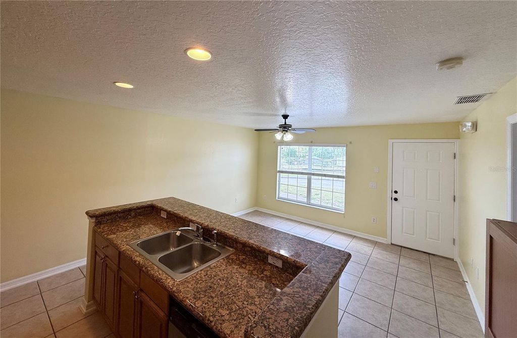 Photo of 121 Melissa Place, Davenport, FL 33837 (MLS # O6396219)