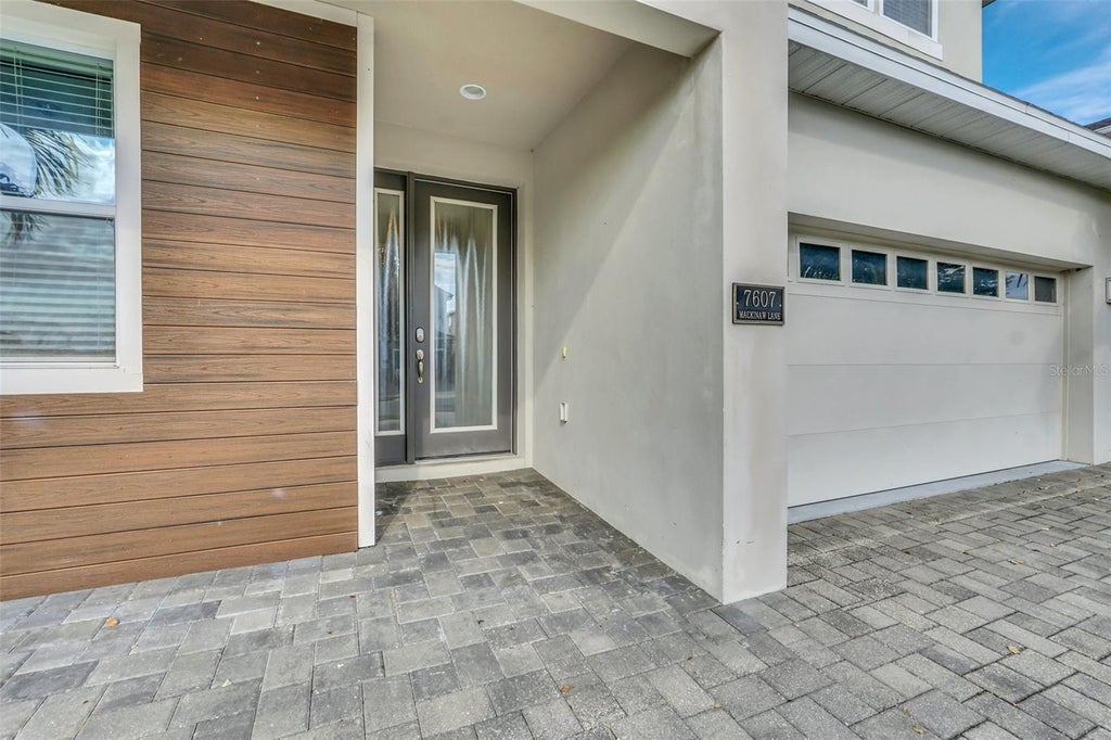 Photo of 7607 Mackinaw Lane, Kissimmee, FL 34747 (MLS # O6449290)