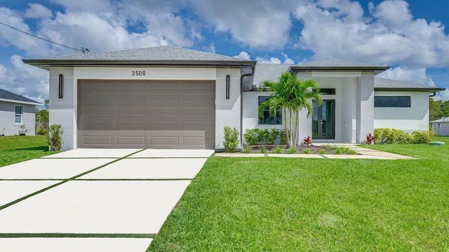 One or more photo(s) has been virtually staged. ** BRAND NEW CONSTRUCTION ON A CORNER LOT ** MOTIVATED SELLER WILLING TO CONTRIBUTE TO CLOSING COSTS ** BUILDER WARRANTY INCLUDED **
Step into a level of craftsmanship that rises above typical new construction. This nearly 1,900 sq ft custom home sits proudly on a corner lot and blends modern design with thoughtful detail at every turn. Sleek tile floors, soaring 9' ceilings with 10' tray accents, and 8' doors create an airy, upscale feel throughout the open-concept layout.
The split floor plan includes 3 bedrooms (2 ensuites), a spacious den (easily converted to 4th bedroom) with pocket sliders, and 3 full bathrooms with custom vanities, backlit mirrors, and tiled showers. The primary suite features a spa-like bath and large custom closet, while the second bedroom serves as a cabana-style ensuite—ideal for guests or future pool access. All closets include custom built-ins. The chef’s kitchen offers European-style cabinetry, quartz countertops, a waterfall island, under-cabinet lighting, a large pantry, and Samsung stainless steel appliances. The dining area, great room, and primary bedroom open through 8' sliders to a spacious lanai with matching tile and outdoor kitchen hookups—perfect for indoor-outdoor living. Additional highlights include impact windows and doors, an epoxy-finished garage, a laundry room with utility sink and Samsung washer and dryer, and a unique grass-interlaced driveway. The backyard offers plenty of space for a pool, and no flood insurance is required. A home with premium finishes, thoughtful design, and standout quality—offering exceptional value in today’s market!