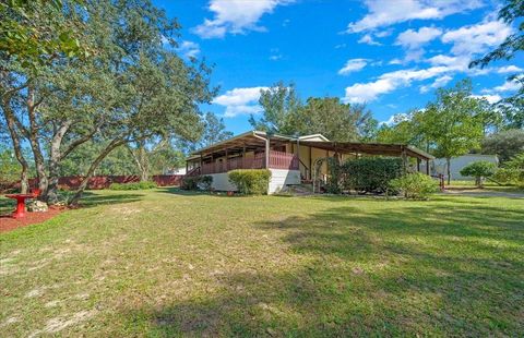Photo of 16651 SW 42nd Loop, Ocala, FL 34481 (MLS # OM711761)