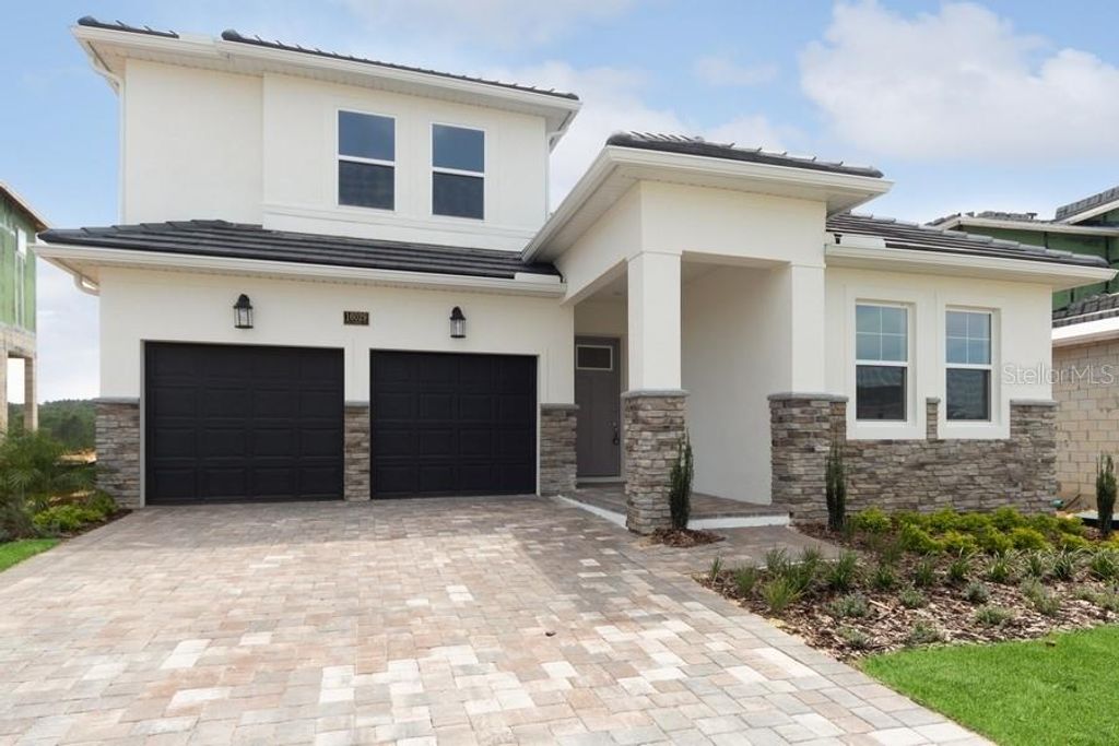 Photo of 16029 Volterra Point, Montverde, FL 34756 (MLS # TB8477901)