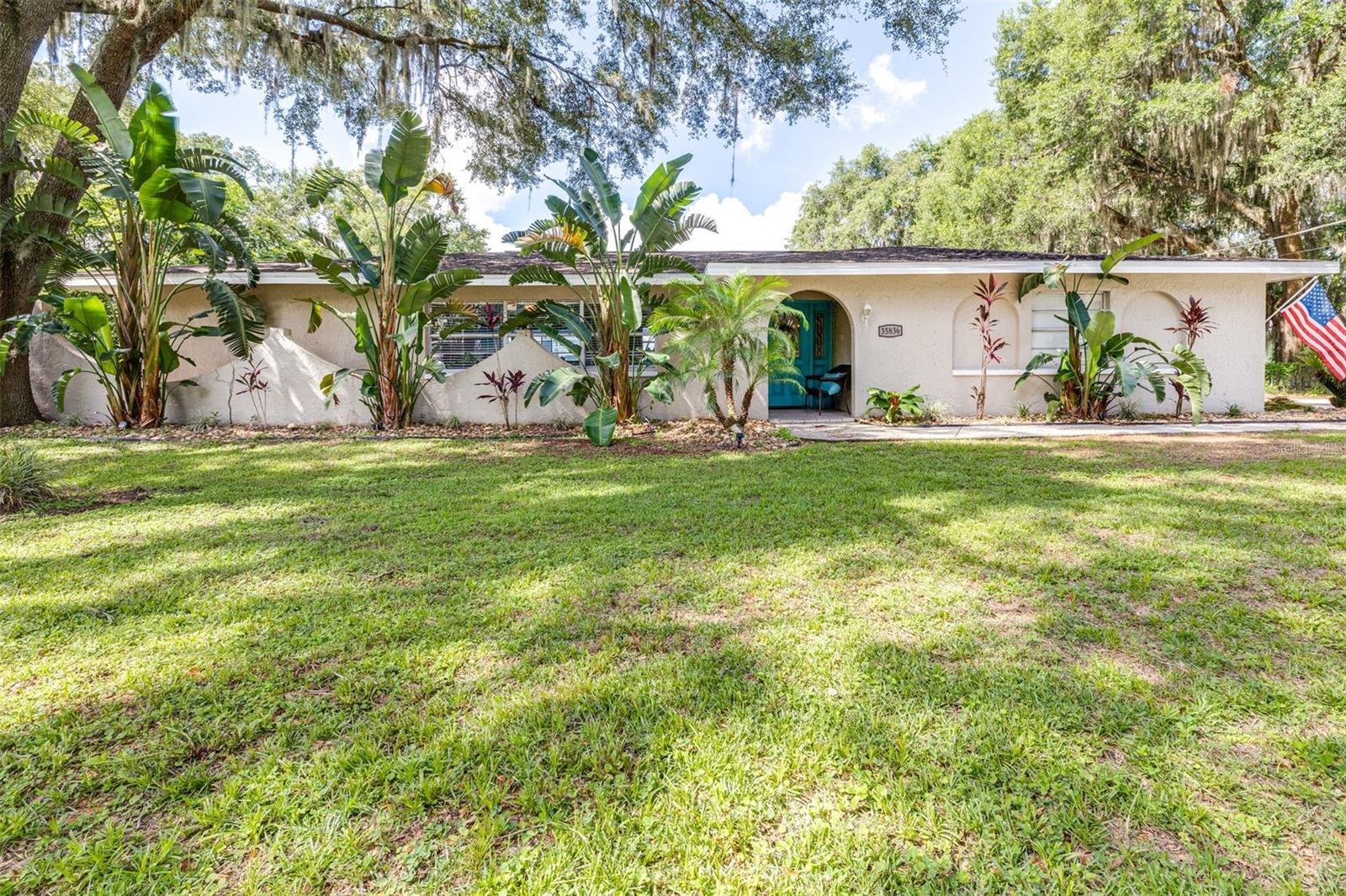 JUST REDUCED! Lakefront Family Home with Pool, Bonus Room & Spacious Kitchen on 1 Acre!
This 4-bedroom, 3-bath home offers the perfect blend of comfort, space, and outdoor fun for the whole family. Set on a full acre, it features a 30,000-gallon pool with beautiful lake views — ideal for swimming, relaxing, or fishing right from your backyard.
Inside, you’ll love the spacious kitchen with solid wood cabinets and plenty of room for cooking and gathering. A bonus room off the pool area is perfect for a playroom, home office, or guest space.
The yard is lined with tropical Areca palms for privacy, and the large front lawn gives kids space to run and play. This is a place where lasting family memories are made — peaceful, private, and full of potential.