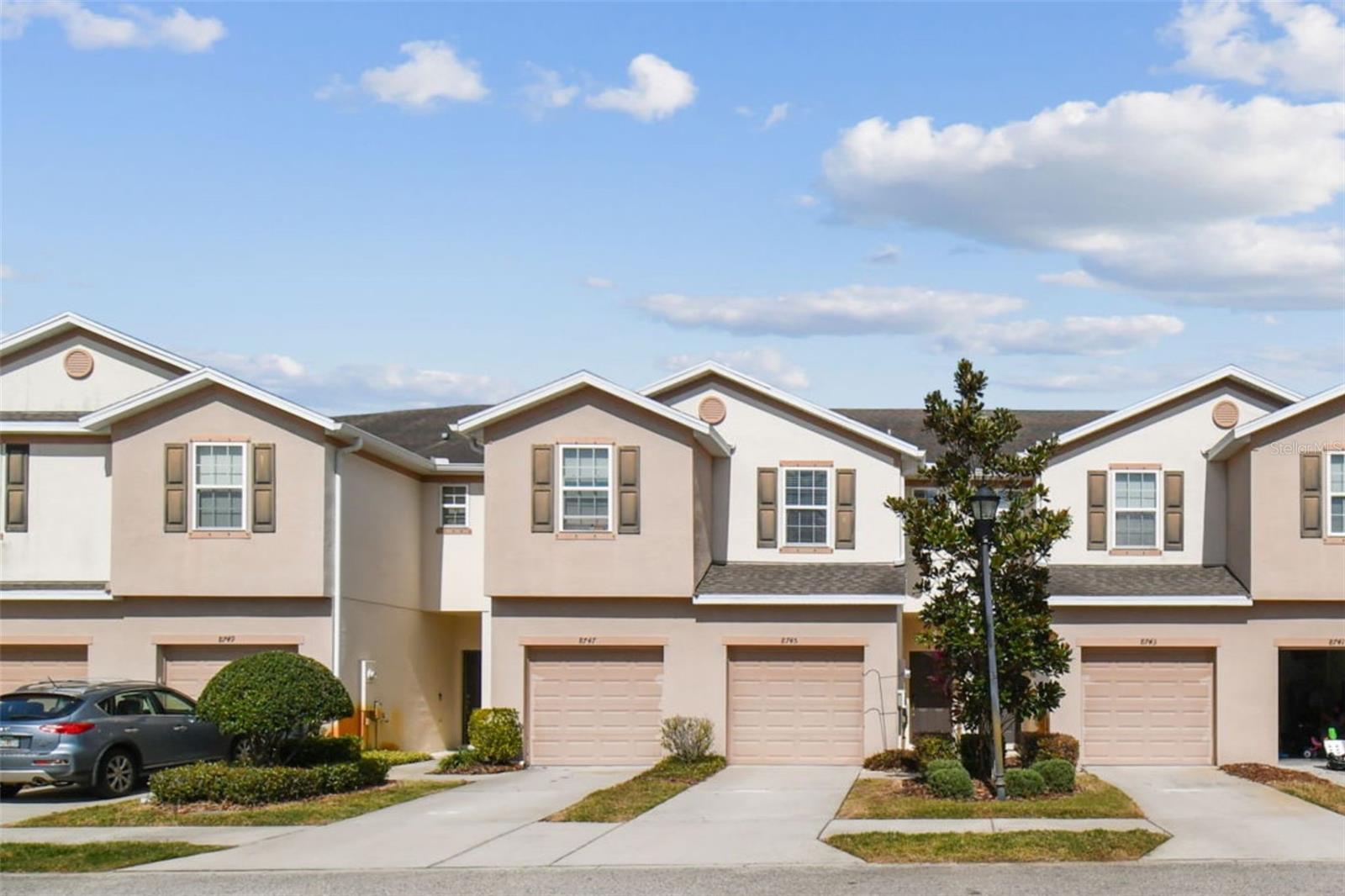 Welcome to Magnolia Park! This 2 bedroom, 2.5 bathroom townhouse is centrally located at the crossroads of Tampa, Brandon, and Riverview. Granite countertops in the kitchen and bathrooms and laminate flooring in the living room give a sleek and updated feel to your new home. A one car garage provides the extra storage space you're looking for! Both bedrooms are upstairs and feature spacious closets and en-suite bathrooms. The Magnolia Park community has playgrounds, pools, and nearby pickleball courts. The HOA covers exterior maintenance, landscaping, water and sewer! Conveniently located minutes from the Crosstown Expressway, you have easy access for commuting to Downtown Tampa, Water Street, and Channelside. The home has also offers many conveniences with its close proximity to restaurants, shopping, and groceries.