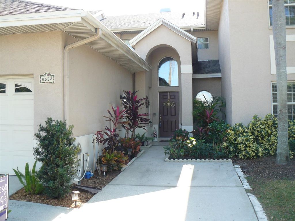 Photo of 8628 Sweet Magnolia Pl, Seminole, FL 33777 (MLS # TB8458078)