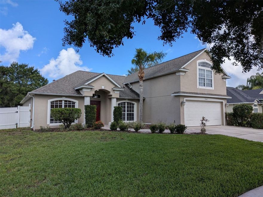 Spacious, updated, 5 bedroom, 3 bathroom single family home in the gated community of East Lake Cove. Split floor plan with large in-law suite on second floor. Primary bedroom features completely renovated bathroom and two walk in closets. Tile and laminate flooring throughout entire home, no carpet. Laundry room with washer / dryer. 2 car garage. Large fenced in back yard. Dry bar on outdoor patio. Updated kitchen with stone countertops and stainless steel appliances. Lawn care included.