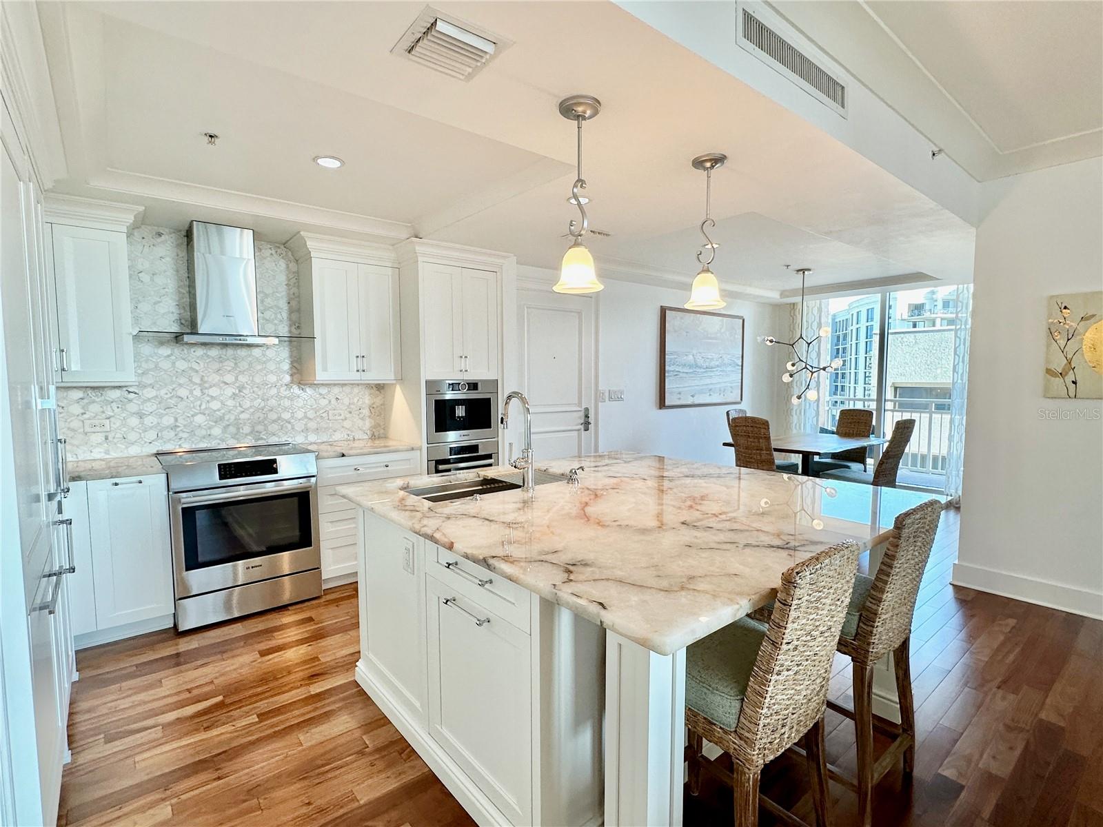 FURNISHED Rental – Available Immediately. $4,500/Month through December 31, 2025, $10,000/mo Dec 15-April 15th 2025, $5500/month annually. 3 month minimum rental.
CORNER UNIT with lots of natural light located on the 14th floor of 1350 Main in downtown Sarasota, this furnished 2 bed, 2 bath condo offers a spacious split floor plan with hardwood floors, high-end finishes, and two private terraces with city views. The updated kitchen features quartzite countertops, stainless steel appliances, and custom cabinetry.
The primary bedroom includes a walk-in closet and modern bath with soaking tub and walk-in shower. The second bedroom/den has wood flooring and a nearby full bath. In-unit laundry and assigned garage parking.
1350 Main offers resort-style amenities: heated pool, fitness center, 24-hour concierge, BBQ grills, club house, pool table, library, social hall, guest suite, and more. Just steps from restaurants, shops, and cultural venues