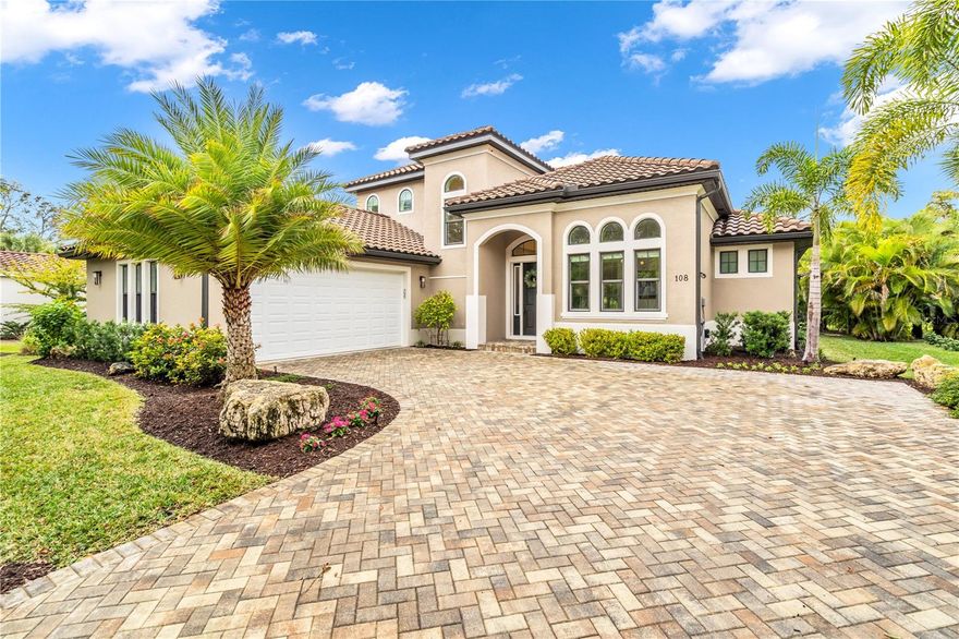 Welcome home! This fantastic Island of Venice property is nestled on a beautiful canopied street just a very short walk to both the beach AND Historic downtown Venice. This home boasts 4 bedrooms, 3.5 baths, plus an office/den and an over sized 2 car garage with room for your golf cart. Built only 4 years ago, this home has all the newest bells and whistles,, is not in the flood zone, and is move-in ready! This two-story home features a generously sized primary bedroom suite with 2 walk-in closets, dual sinks, open walk-in shower, and sliders leading out to the lanai. There is also a second guest bedroom with full bath that could be considered a second primary on the first floor, which also has access to the lanai.  There is an office/den that can serve as a fifth bedroom as needed, with a beautiful half bath right next door. This home has a separate laundry room as well, that includes a deep sink and extra storage. The kitchen is a chef's dream with a large island, walk-in pantry, striking quartz countertops/back splash, and a convection oven, induction cooktop and hood vent. The breakfast/dining area looks onto the great room and the lanai. The 2 private bedrooms and additional full bath are tucked away upstairs for added privacy. Enjoy the outdoors in your own tropical oasis,  with lush landscape, an artificial turf yard for easy upkeep, heated salt water pool, paver brick lanai and additional area for dining or relaxing. The curb appeal of this home is spectacular with paver driveway, entry and tastefully landscaped yard. Enjoy all of the benefits of living perfectly situated between the beach and historic downtown Venice. Walk to the beach for fun in the sun, or to the farmer's market and downtown for shopping, dining or music! For the sports enthusiasts - pickle ball, tennis, and basketball are also just around the corner. This home is the perfect combination of location, layout and sophistication! Everything you could want in an island home - Call and make an appointment to preview your new home today.