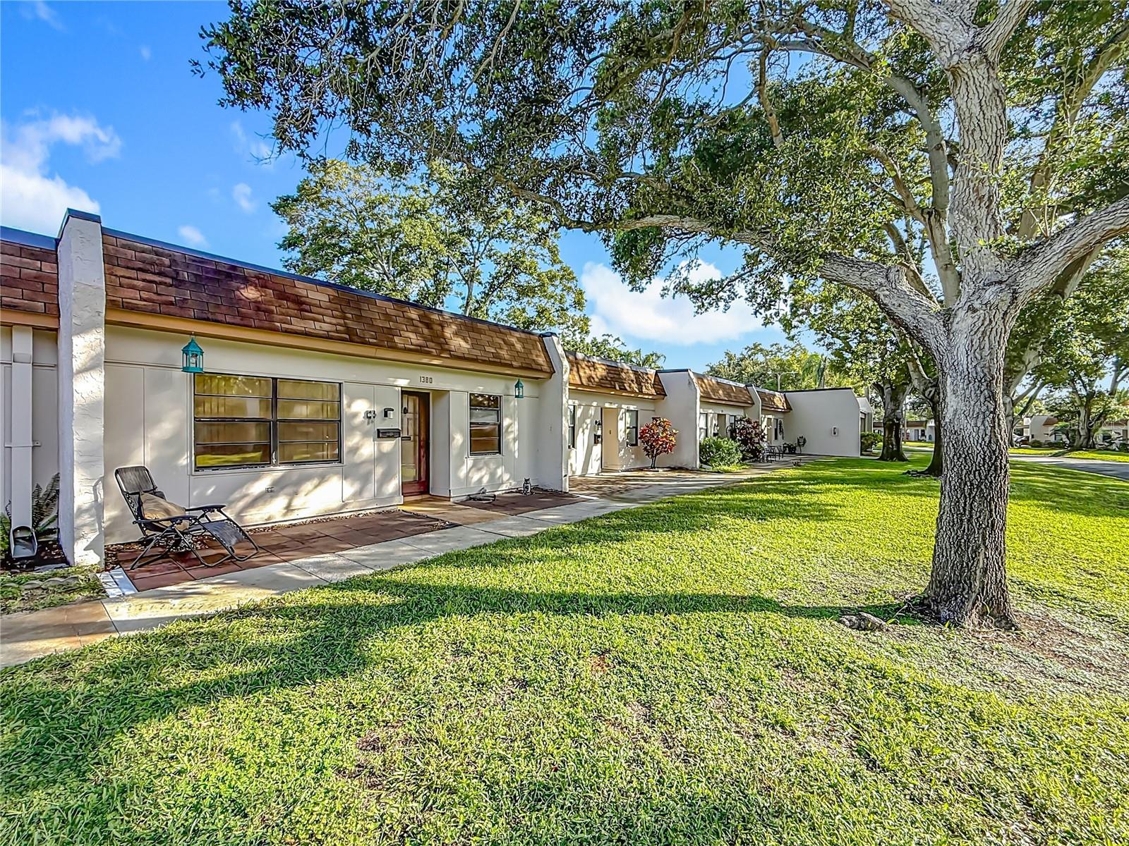 This 1 bed / 1 bath END UNIT VILLA in Mission Hills is your chance to get into one of Clearwater’s most desirable 55+ communities at an affordable price. Needs some TLC—perfect for a handy buyer or investor ready to renovate and build sweat equity. Includes covered carport and private storage shed just steps from your door.
Mission Hills is known for its beautiful grounds and active lifestyle—offering a community pool, shuffleboard, ping pong, fitness room, library, and social events like bingo, dinners, and more. Located in a non-evacuation zone with walkable access to Publix, Starbucks, restaurants, banks, and more. Easy access to Safety Harbor, the Ream Wilson Trail, beaches, and both TIA & PIE airports.
Bring your vision and make it your own! Priced accordingly—schedule your showing today.